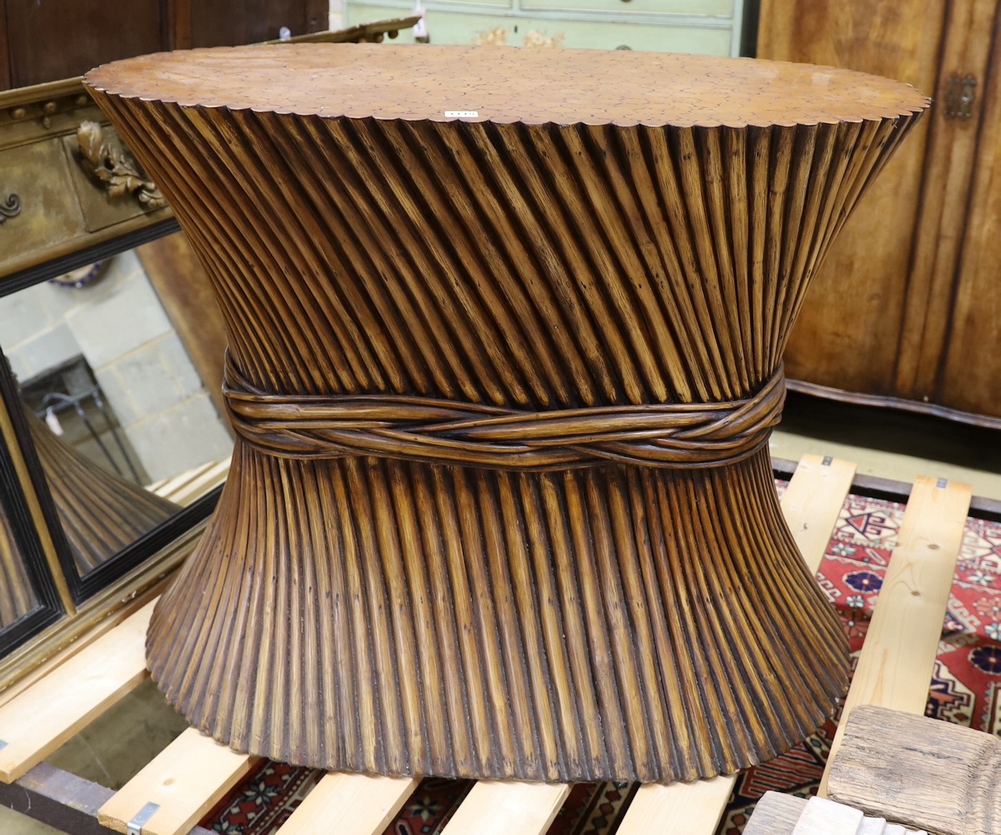 A contemporary centre pedestal table, modelled as bound branches, width 94cm, depth 52cm, height 74cm